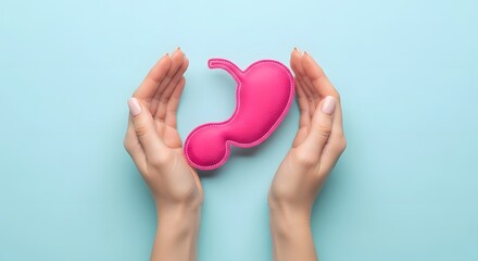 Fototapeta premium National Gallbladder Day Hands cradling a pink stomach symbol, representing health and well-being
