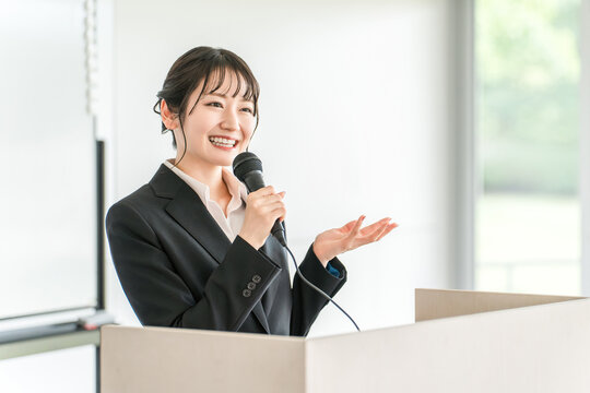 Businesswoman giving a presentation at a meeting, training session, or presentation
