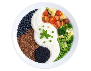A colorful and balanced vegetarian meal featuring rice, cherry tomatoes, broccoli, peas, and various seeds arranged in a yin-yang pattern on a white plate