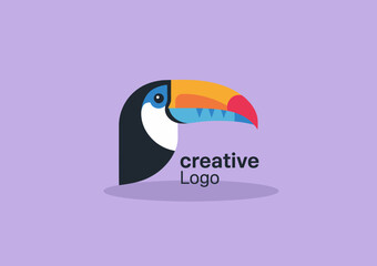 Obraz premium A striking logo featuring a colorful toucan, representing creativity and boldness, perfect for brands focused on nature, wildlife, or adventurous themes.