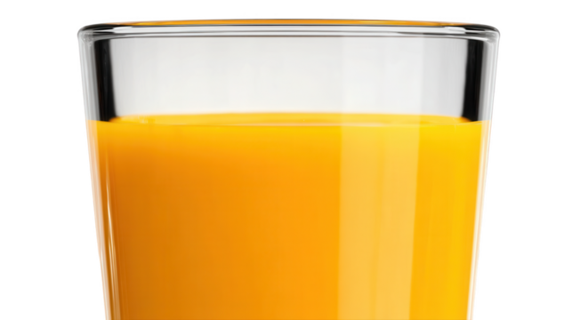 A vibrant glass filled with refreshing orange juice stands tall against a plain black background, highlighting its bright color