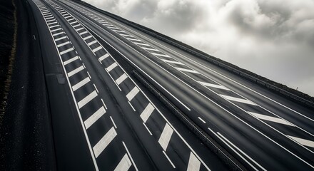 Abstract Highway Shot Capturing Dramatic Roads, Lines, And Overcast Sky Perspective