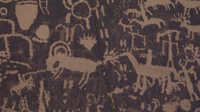 A close up panning shot of petroglyphs at Newspaper Rock near Canyon Lands National Park, Utah