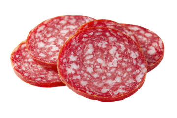 Sliced sausage rounds with fat, on black