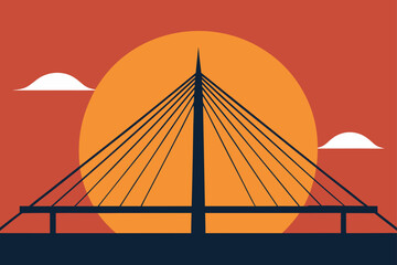 Modern suspension bridge silhouette against a vibrant sunset sky with clouds