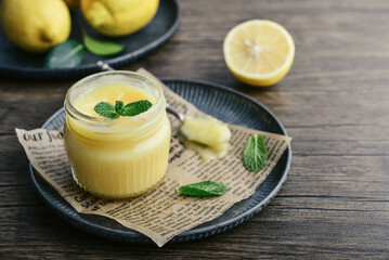 Homemade lemon curd in a glass jar