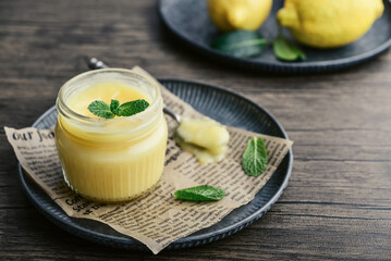 Homemade lemon curd in a glass jar