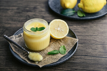 Homemade lemon curd in a glass jar