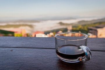 Coffee Cup on Table with Mountain View