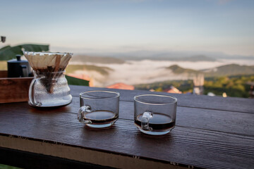 Coffee Cup on Table with Mountain View