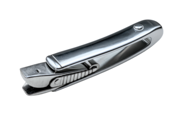 Metal nail clipper with a lever, closed on a black background