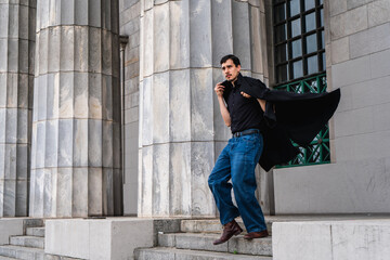 Young man running down building stairs during escape