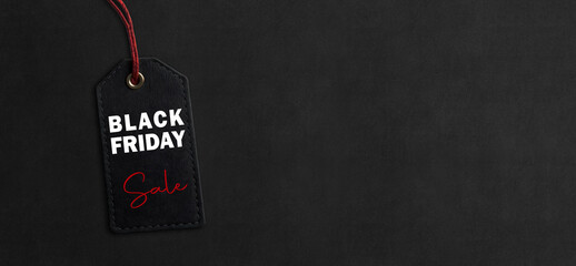 Black friday tag isolated on black background with copy space. Black Friday advertising, special...
