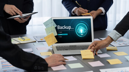 Analyst team use sticky note for creative and analytic brainstorm for business idea with BI data dashboard on laptop screen. Analysis financial data visualization tech for marketing strategy. Prodigy