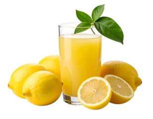 A glass of fresh lemon juice surrounded by whole and sliced lemons with green leaves on top
