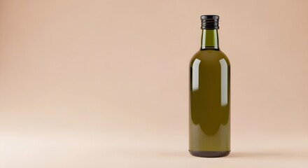 Empty Green Glass Bottle with Black Screw Cap on Beige Background