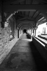 Empty corridor with shadows and depth