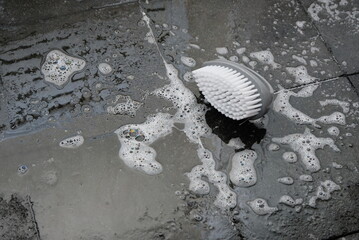 laundry brush on a laundry foam