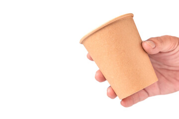 A hand holding a plain kraft paper cup on white background, suitable for eco friendly ideas, beverage service, branding mockup, or takeaway drink usage