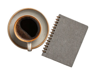 Coffee in cup & notebook w/ spiral, viewed from above