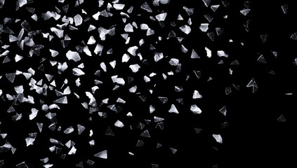 Numerous sparkling, irregular white and silver particles scattered across a black background