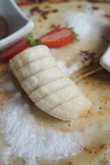 Delicious banana slice on a sweet tortilla dessert