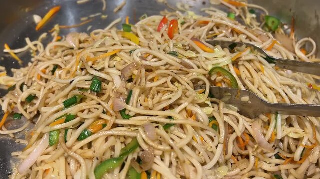 Veg chow mein served in an Indian wedding
