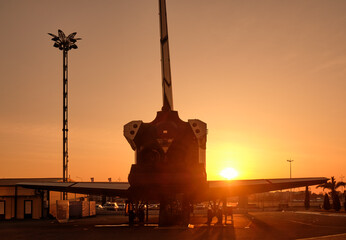Full-size model of the Buran space shuttle in an Science and Art Park at sunset.   Sirius. Russia