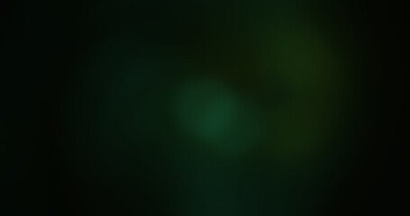 Abstract dark green and teal blurred background with soft light bokeh effect, ideal for overlays, textures, and modern graphic design projects