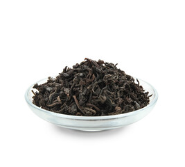 Bowl of dry black tea leaves on white background