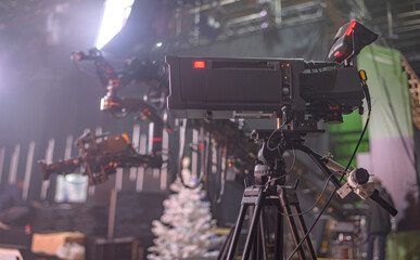 TV cameras on the set of a Christmas TV show