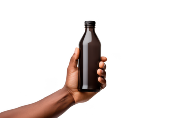 Hand holding dark glass bottle on transparent background