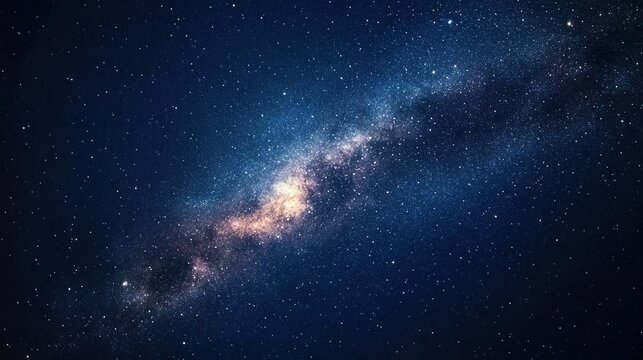 The Milky Way galaxy stretches across a dark blue night sky, filled with countless stars and a prominent spiral arm.