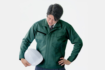 ぐったりする作業員男性