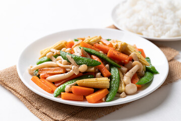 Stir fried vegetables, Green pea, Carrot, Baby corn and Shimeji mushroom with soy sauce, Asian...
