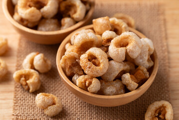 Pork rind in a wooden bowl, Northern Thai food