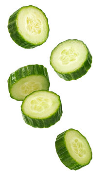 isolated photograph of fresh green cucumber slices falling and floating mid-air against a pure transparent background, highlighting the healthy and refreshing vegetable.