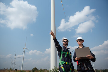 Wind Turbine Maintenance and Repair Technician, Engineer Checking Turbines working maintenance clean power generator system