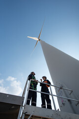 Wind Turbine Maintenance and Repair Technician, Engineer Checking Turbines working maintenance clean power generator system