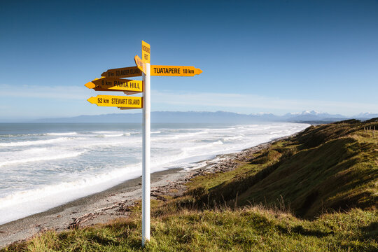 Directional signpost near the coastline, South island, New Zealand
