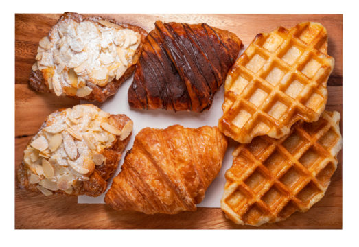 Freshly baked Waffle and Croissants in wooden plate isolated on white background, Croissants and Waffle on brown wooden plate on White Background PNG File.
