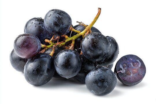 Fresh dark purple grapes with water droplets