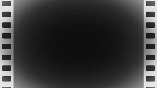 白黒のホラーに使えそうなレトロな映写機風のフィルム動画