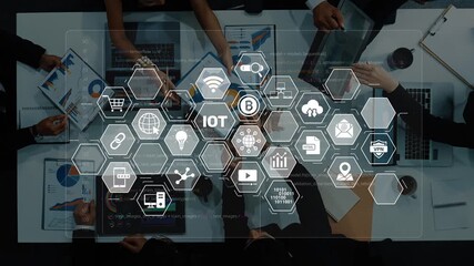 A dynamic corporate meeting showcasing digital transformation and IoT technology with graphs and icons for innovative business strategies and insights. Raster - Powered by Adobe