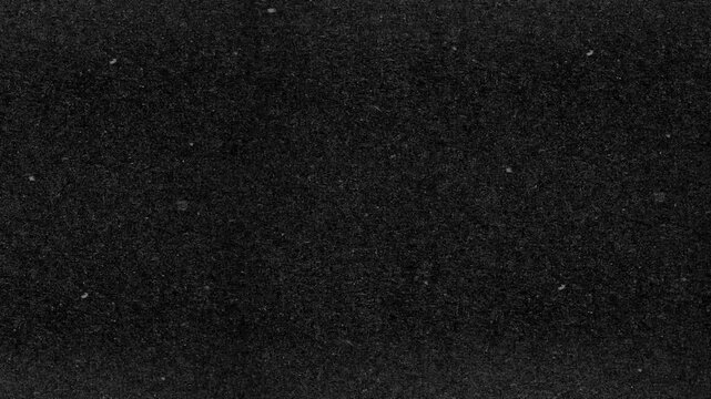 Authentic black and white dust, grain.Vintage film noise overlay.Grunge footage with lines and dust,Old tv noise effect filter texture