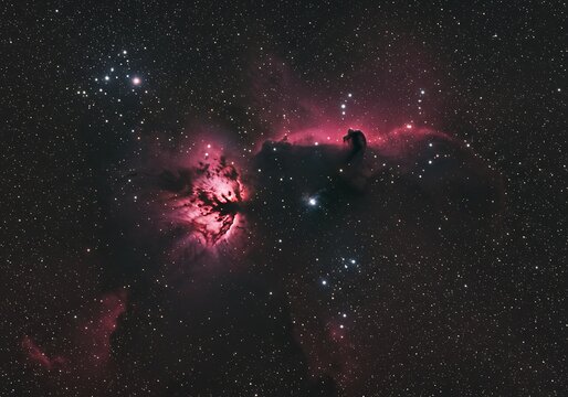 Horsehead nebula in deep space illuminated by stellar radiation - Powered by Adobe