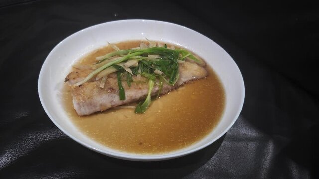 chicken noodle soup,Tim Ikan,Steamed snapper fish with soybean sauce in a plate,Fish in soysauce