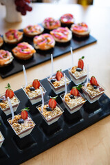 Assorted Mini Desserts and Appetizers on Catering Display