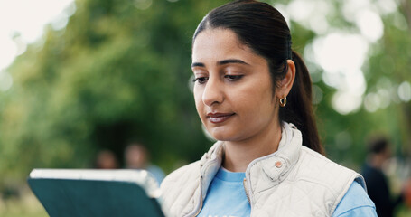 Schedule, tablet and volunteer with woman in park for charity, community outreach or food drive....