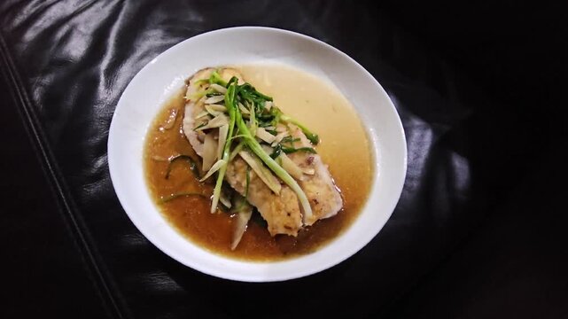 chicken noodle soup,Tim Ikan,Steamed snapper fish with soybean sauce in a plate,Fish in soysauce